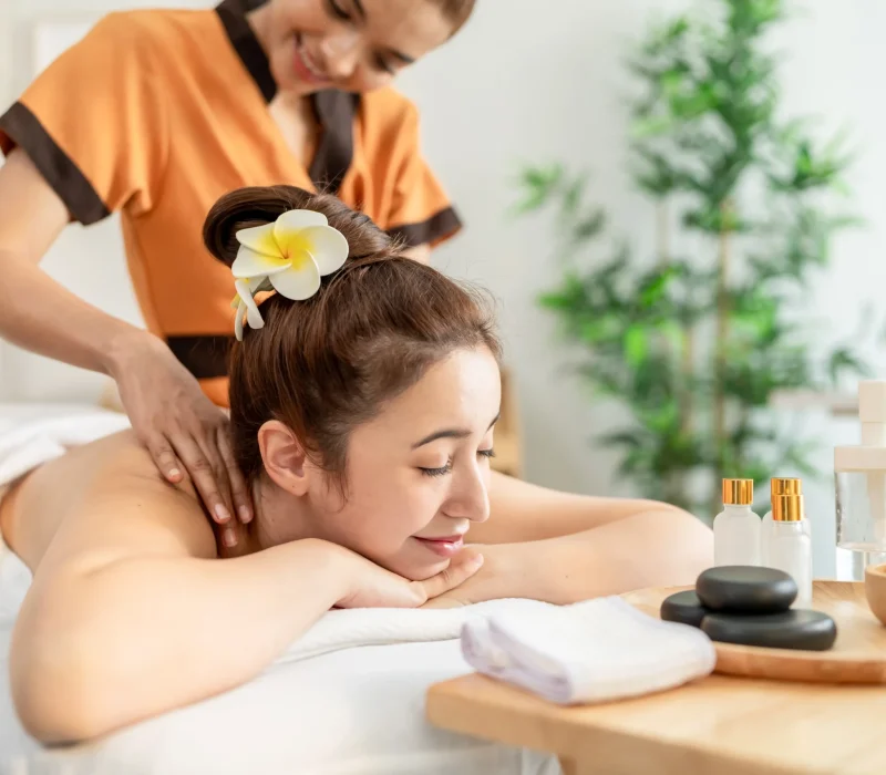 beautiful-relaxing-woman-getting-back-massage-ther-2026-01-08-08-14-14-utc