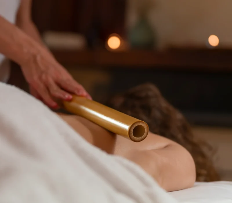 woman-masseuse-performs-a-massage-with-a-bamboo-ca-2026-01-06-10-52-46-utc